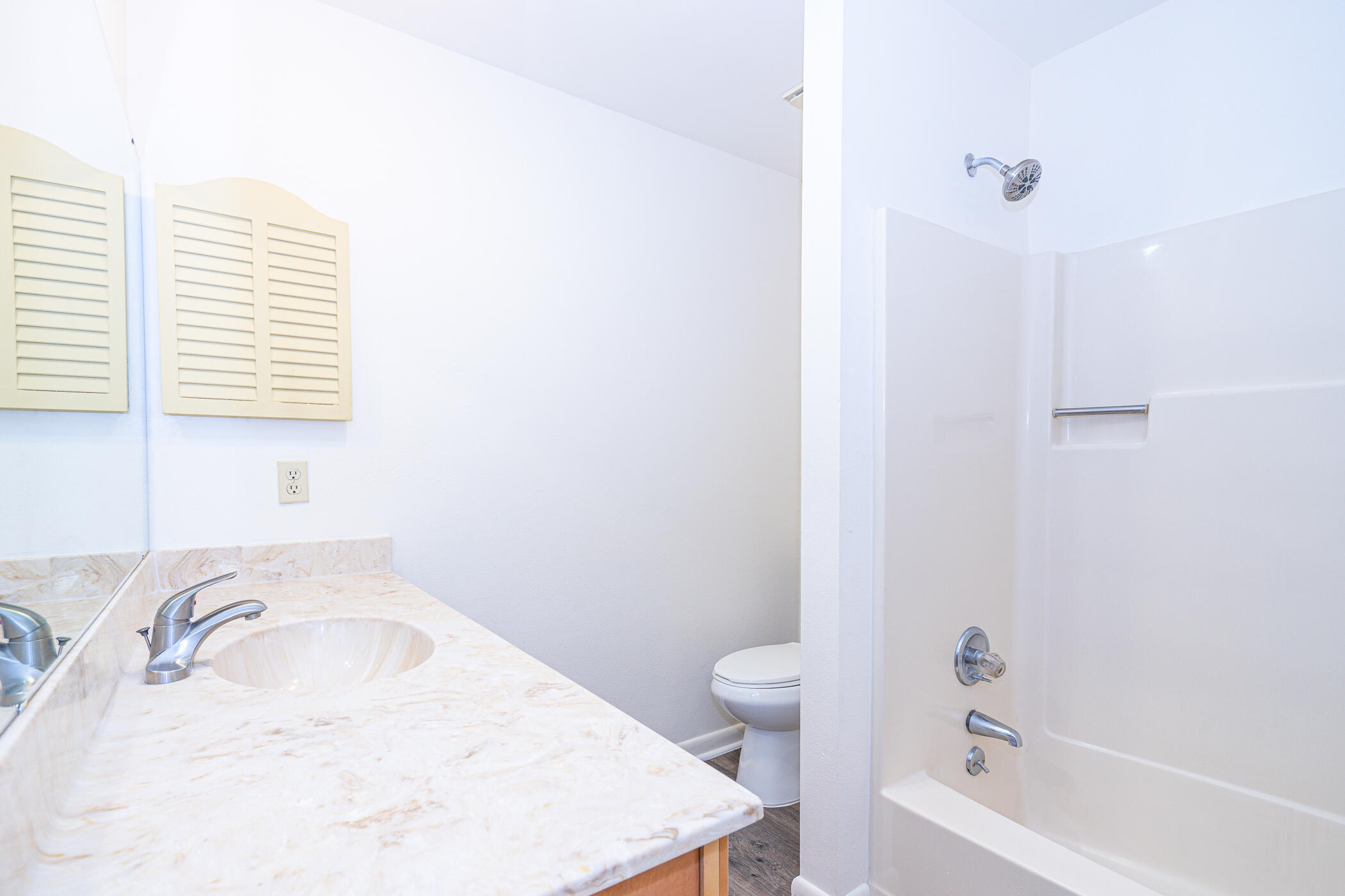 75 7th Street Shalimar, FL 32579 - Photo 6 of 19 a bathroom with a sink a toilet and bathtub