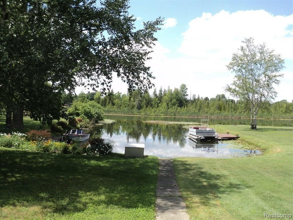 9689 Pine Knob Road Clarkston, MI 48348 - Photo 10 of 17 Protected Cove Setting