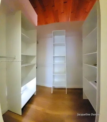 a view of an empty room with empty racks