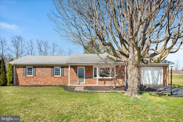 front view of a house with a big yard
