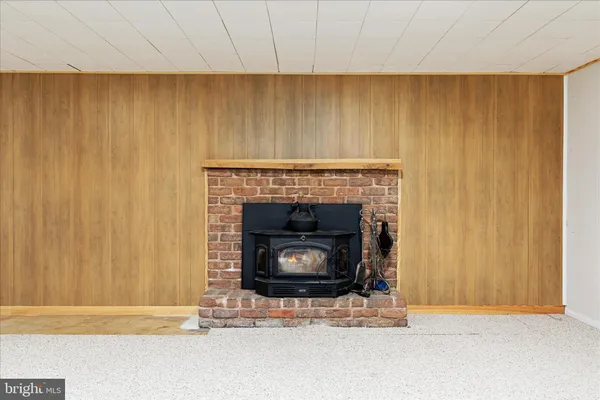 a living room with a fireplace