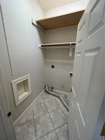 a view of empty room with windows