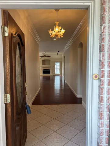 a view of entryway with livingroom