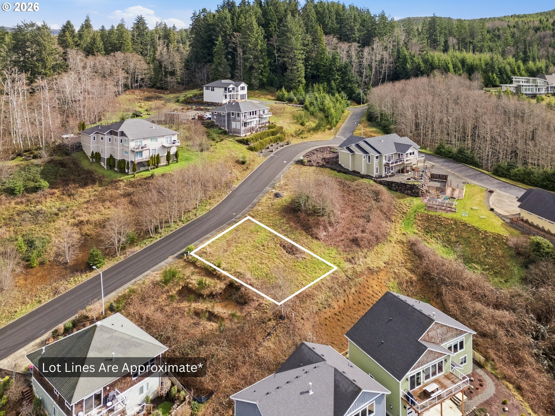 2285 North Fork Road Seaside, OR 97138 - Photo 22 of 22 a view of a lake with couches and wooden floor