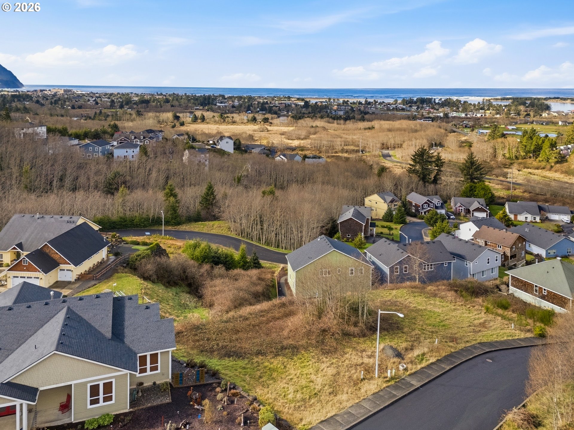 2285 North Fork Road Seaside, OR 97138 - Photo 8 of 22 a view of a lake with a house