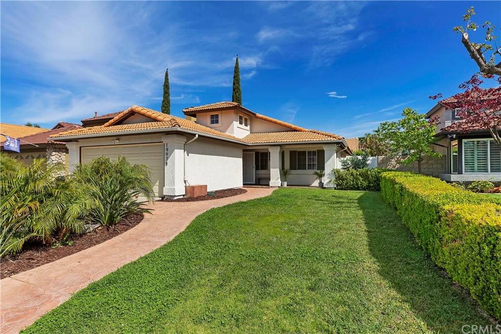 19974 Promenade Circle Riverside, CA 92508 - Photo 1 of 1 a front view of a house with a yard