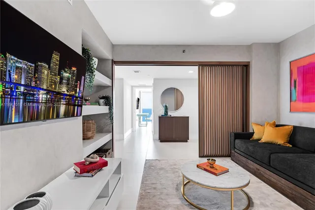 a living room with furniture and a couch