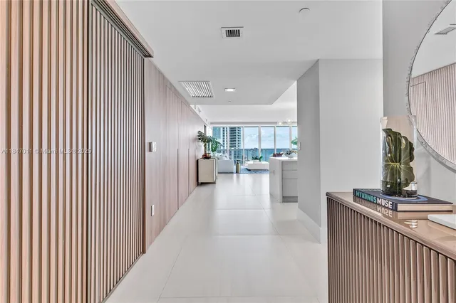 a hallway with a large window