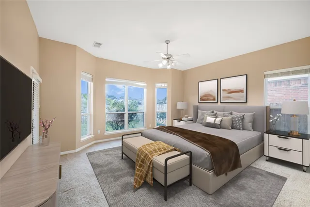 a spacious bathroom with a granite countertop sink a shower a mirror and a bathtub