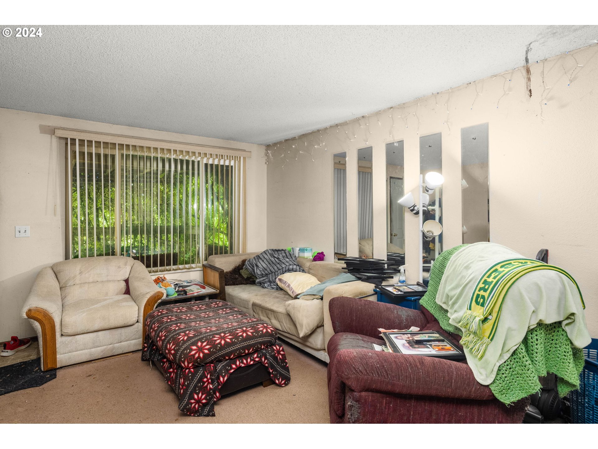 3033 Southeast Condor Avenue Gresham, OR 97080 - Photo 3 of 14 a living room with furniture and a large window