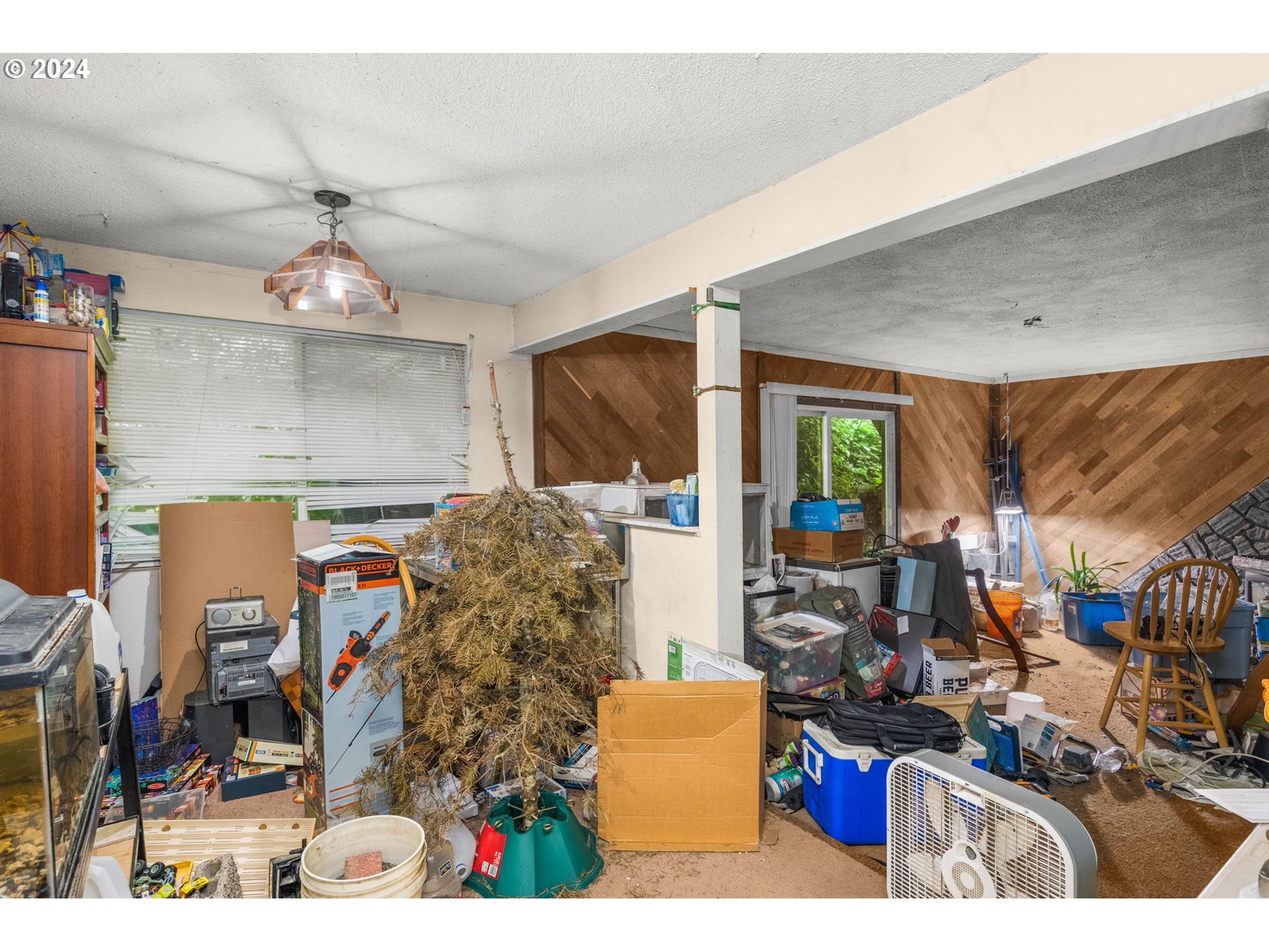 3033 Southeast Condor Avenue Gresham, OR 97080 - Photo 6 of 14 a living room with patio furniture and a fireplace