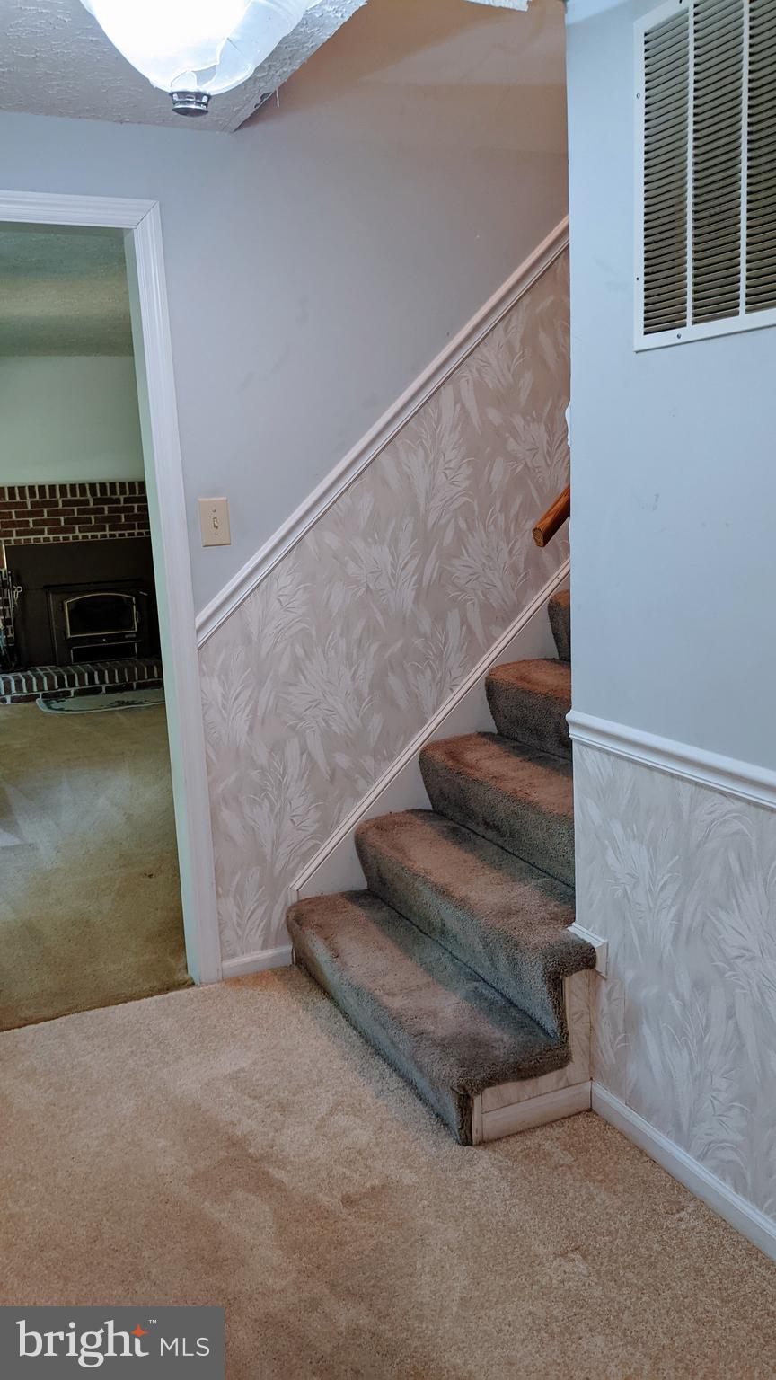 43307 Medleys Neck Road Leonardtown, MD 20650 - Photo 8 of 26 Steps going upstairs