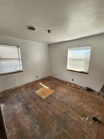 a view of a room and window