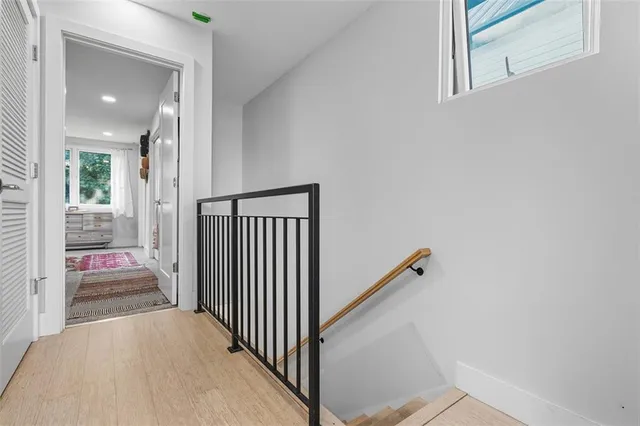 a view of a hallway with a bedroom