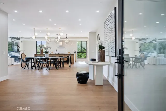 a view of a dining room and chandelier