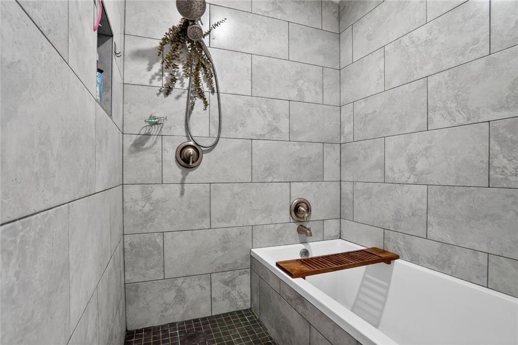 3306 Northcrest Road, Unit A Atlanta, GA 30340 - Photo 14 of 22 a bathroom with a sink and shower