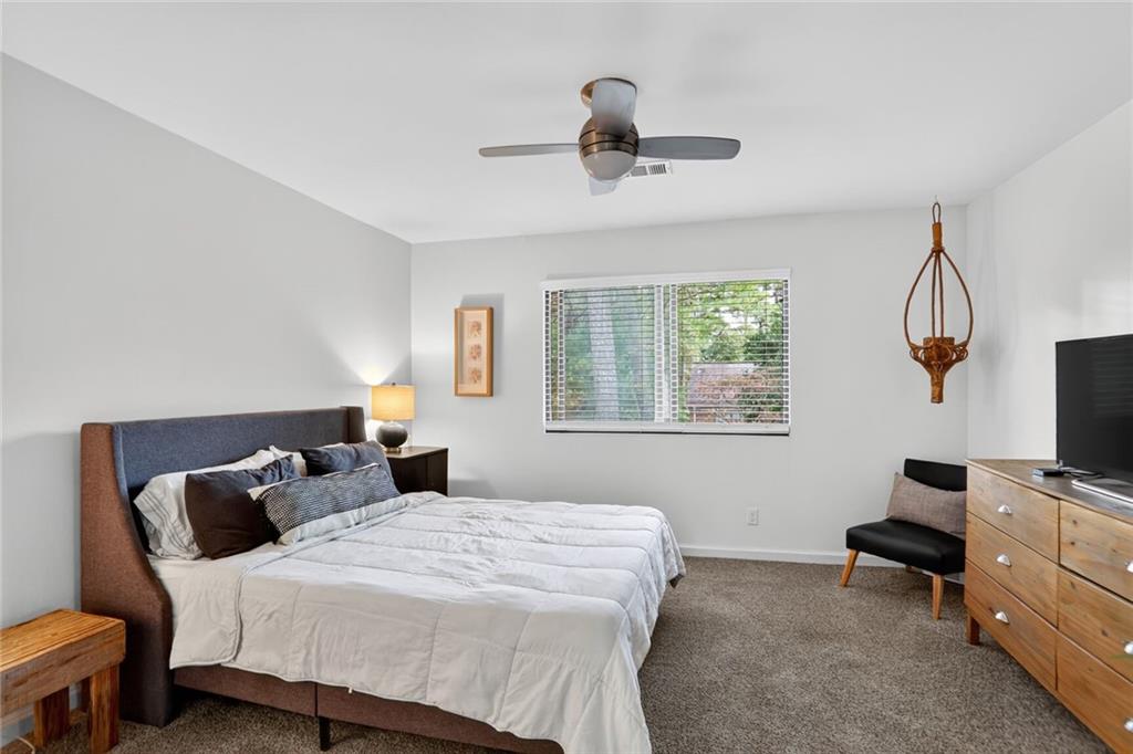 3306 Northcrest Road, Unit A Atlanta, GA 30340 - Photo 16 of 22 a bedroom with a bed and a window
