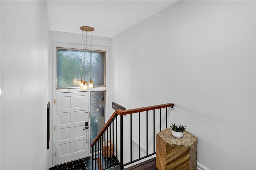 3306 Northcrest Road, Unit A Atlanta, GA 30340 - Photo 17 of 22 a view of a hallway to a room and wooden floor