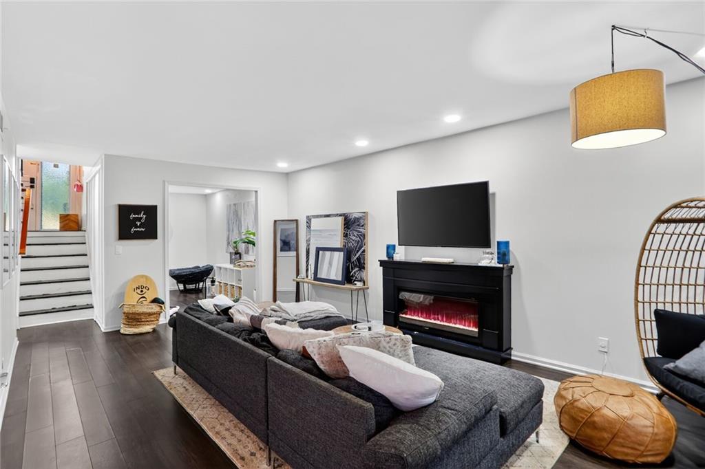 3306 Northcrest Road, Unit A Atlanta, GA 30340 - Photo 4 of 22 a living room with furniture and a fireplace