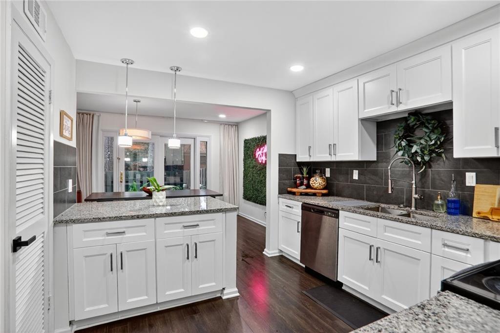 3306 Northcrest Road, Unit A Atlanta, GA 30340 - Photo 7 of 22 a kitchen with white cabinets and sink