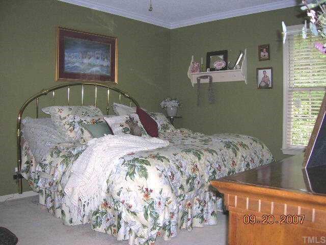 4549 Malvern Road Durham, NC 27707 - Photo 8 of 10 Downstairs Master Bedroom