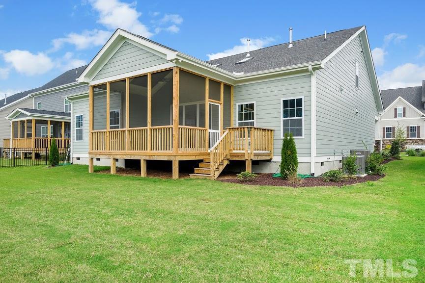 2912 Romealia Lane Raleigh, NC 27613 - Photo 22 of 23 a view of a house with a backyard