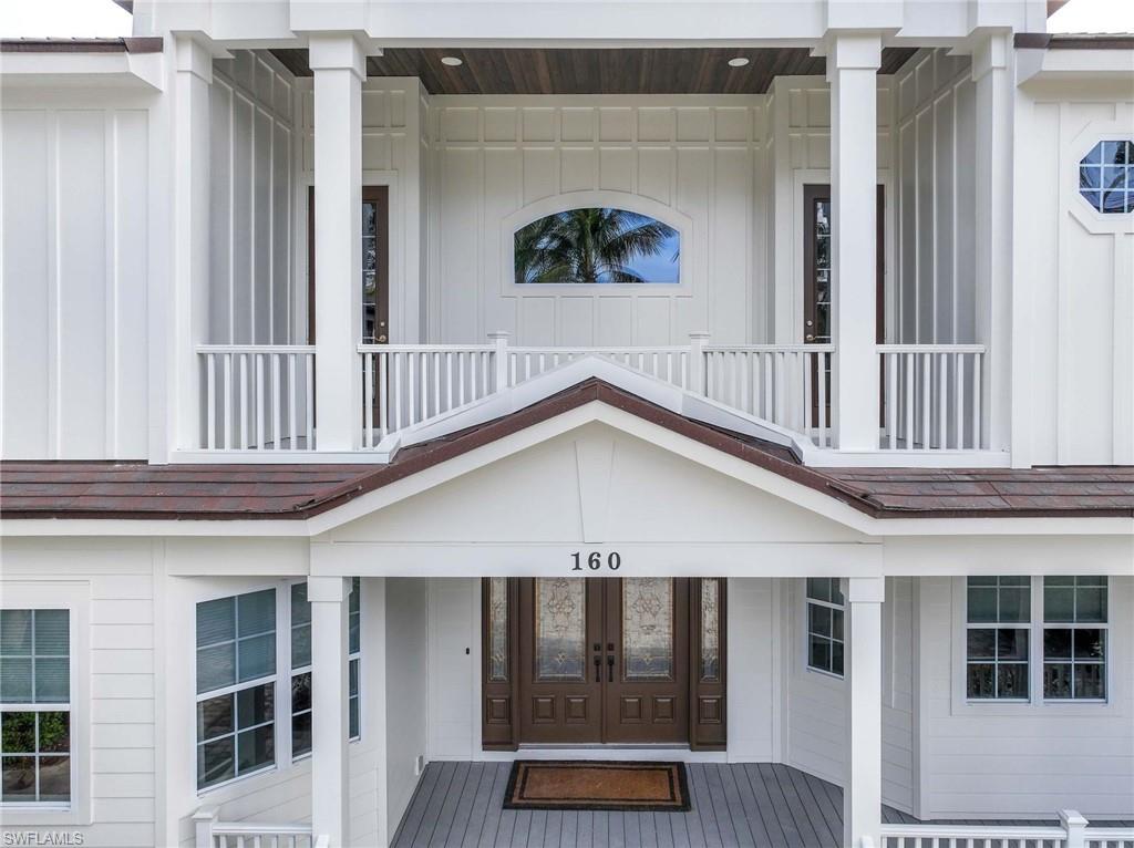 160 3rd Street North Naples, FL 34102 - Photo 4 of 48 a view of backyard with deck
