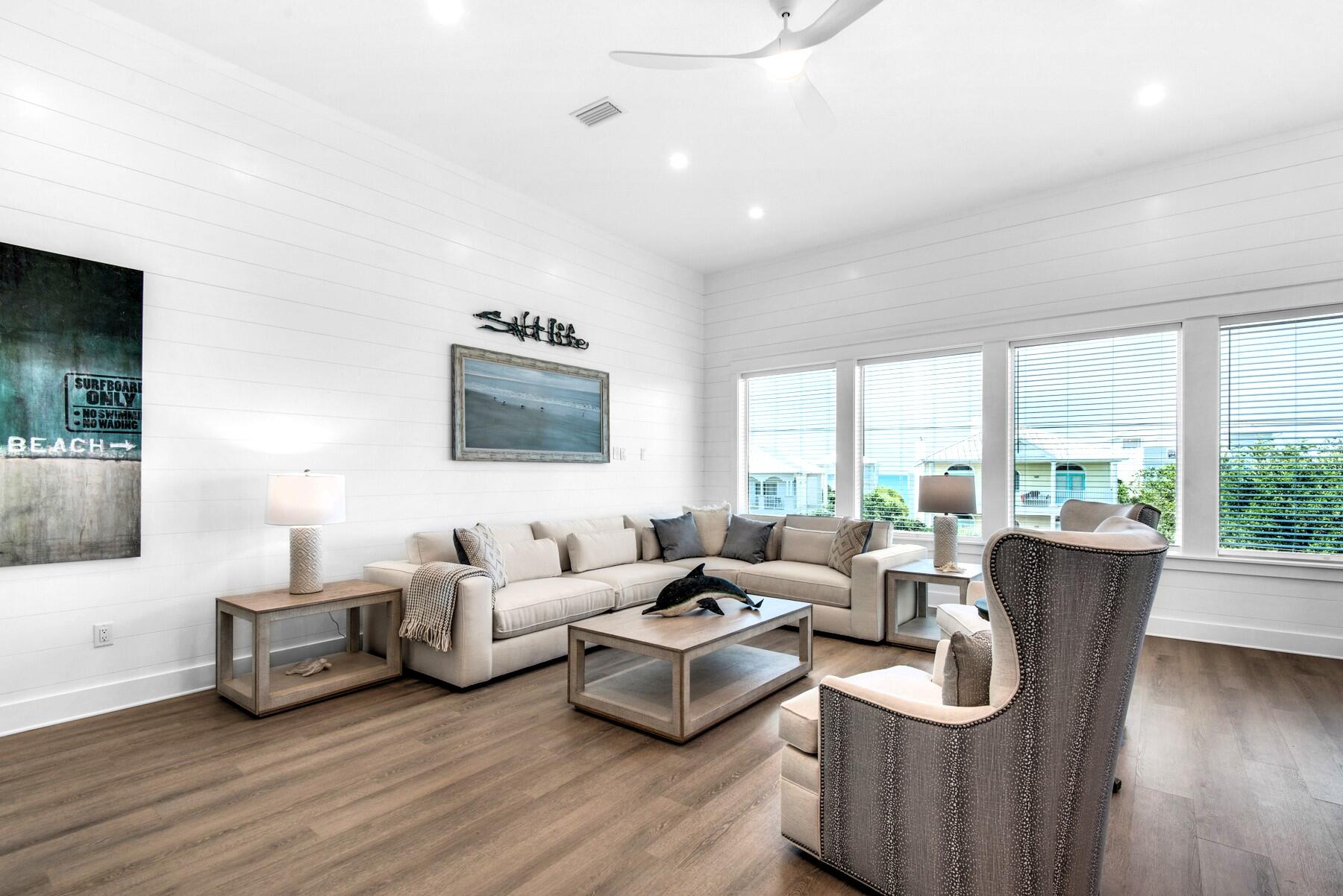 78 Cote D Azur Drive Santa Rosa Beach, FL 32459 - Photo 11 of 80 a living room with furniture and a large window