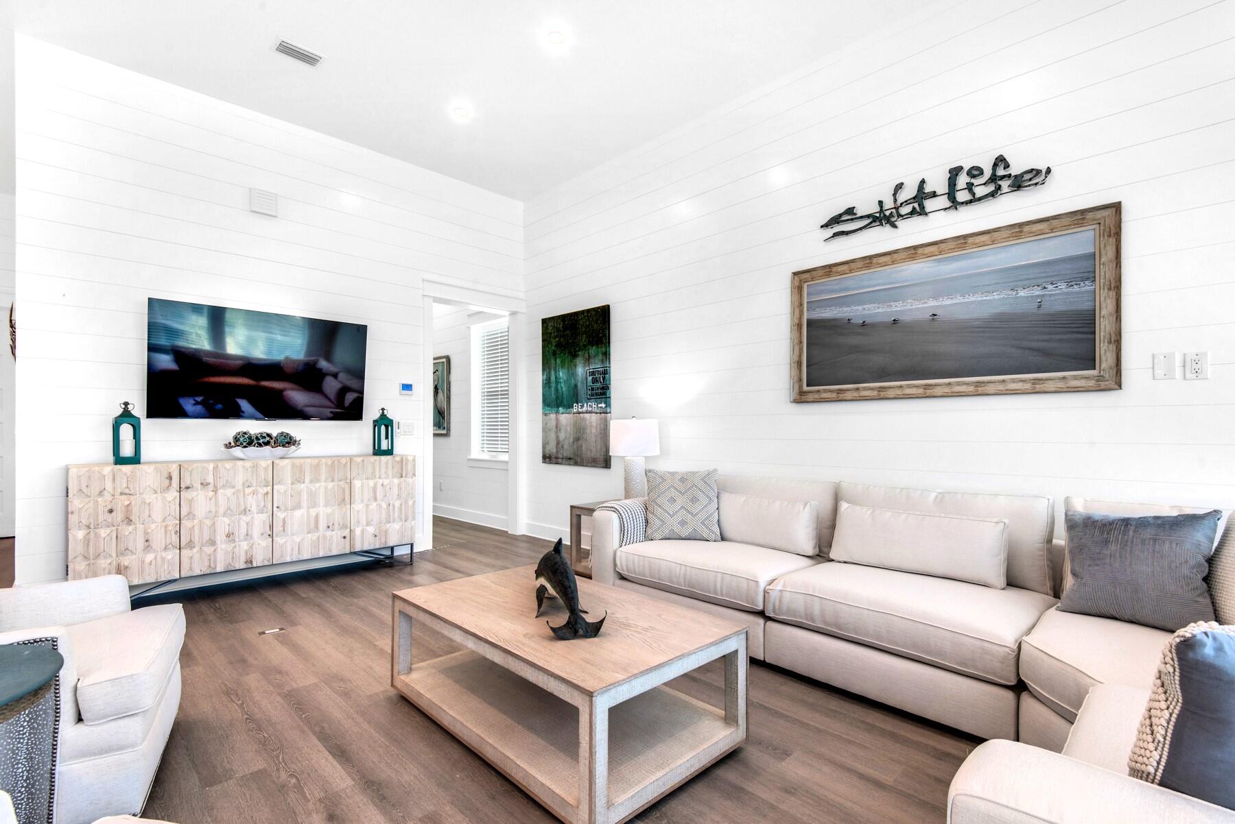 78 Cote D Azur Drive Santa Rosa Beach, FL 32459 - Photo 12 of 80 a living room with furniture and a flat screen tv