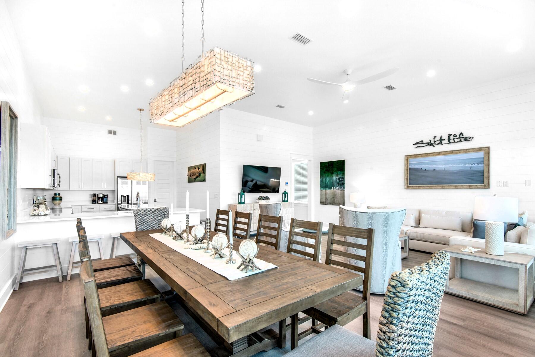 78 Cote D Azur Drive Santa Rosa Beach, FL 32459 - Photo 14 of 80 a living room with furniture a flat screen tv and kitchen view