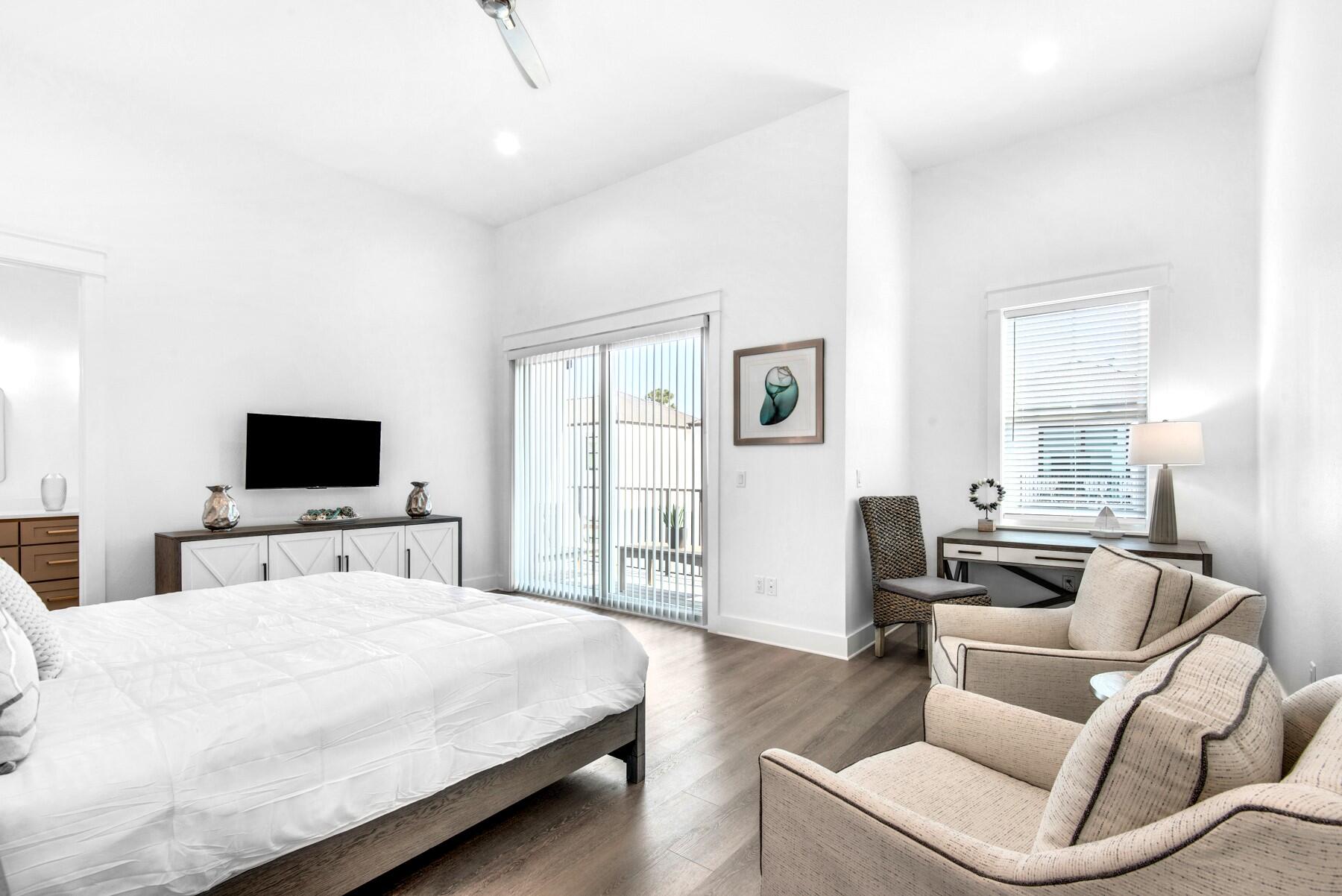 78 Cote D Azur Drive Santa Rosa Beach, FL 32459 - Photo 18 of 80 a room with a bed a flat screen tv and a couch