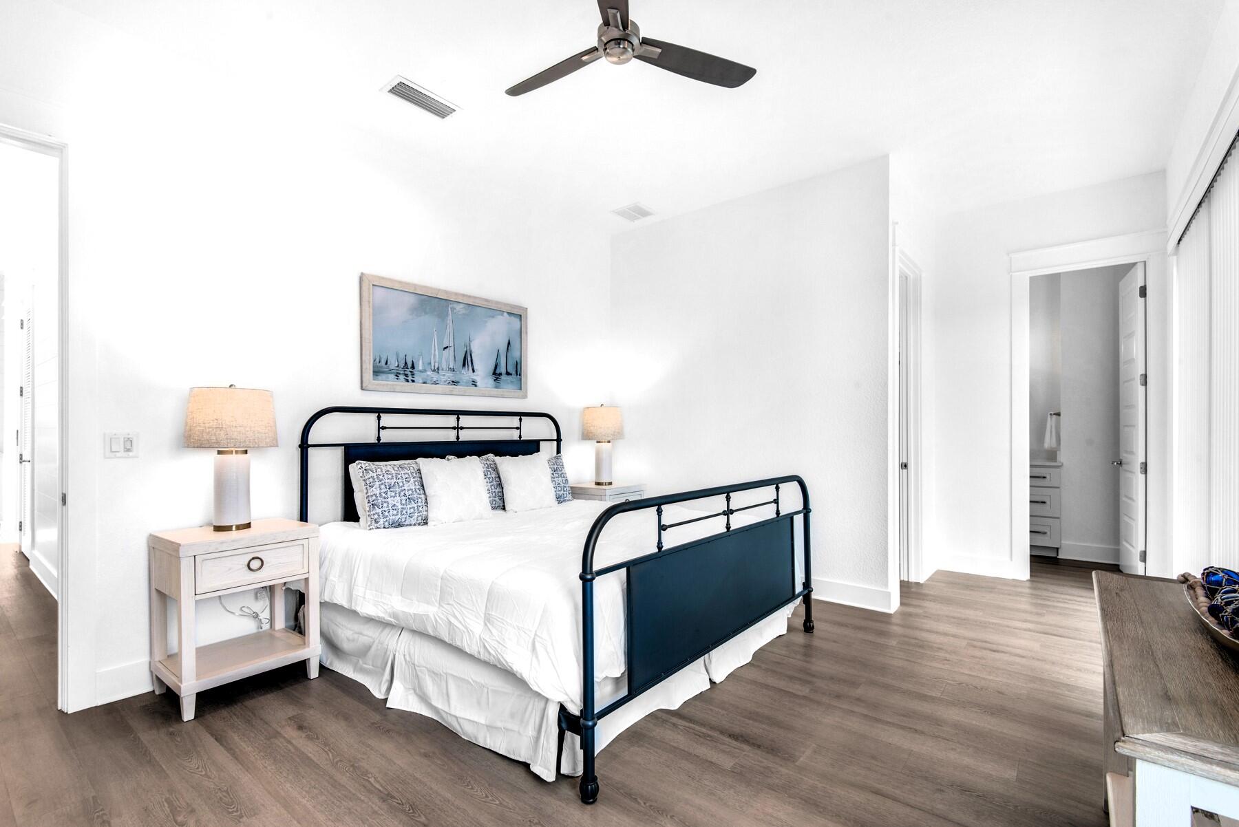 78 Cote D Azur Drive Santa Rosa Beach, FL 32459 - Photo 22 of 80 a bedroom with a bed and a night stand