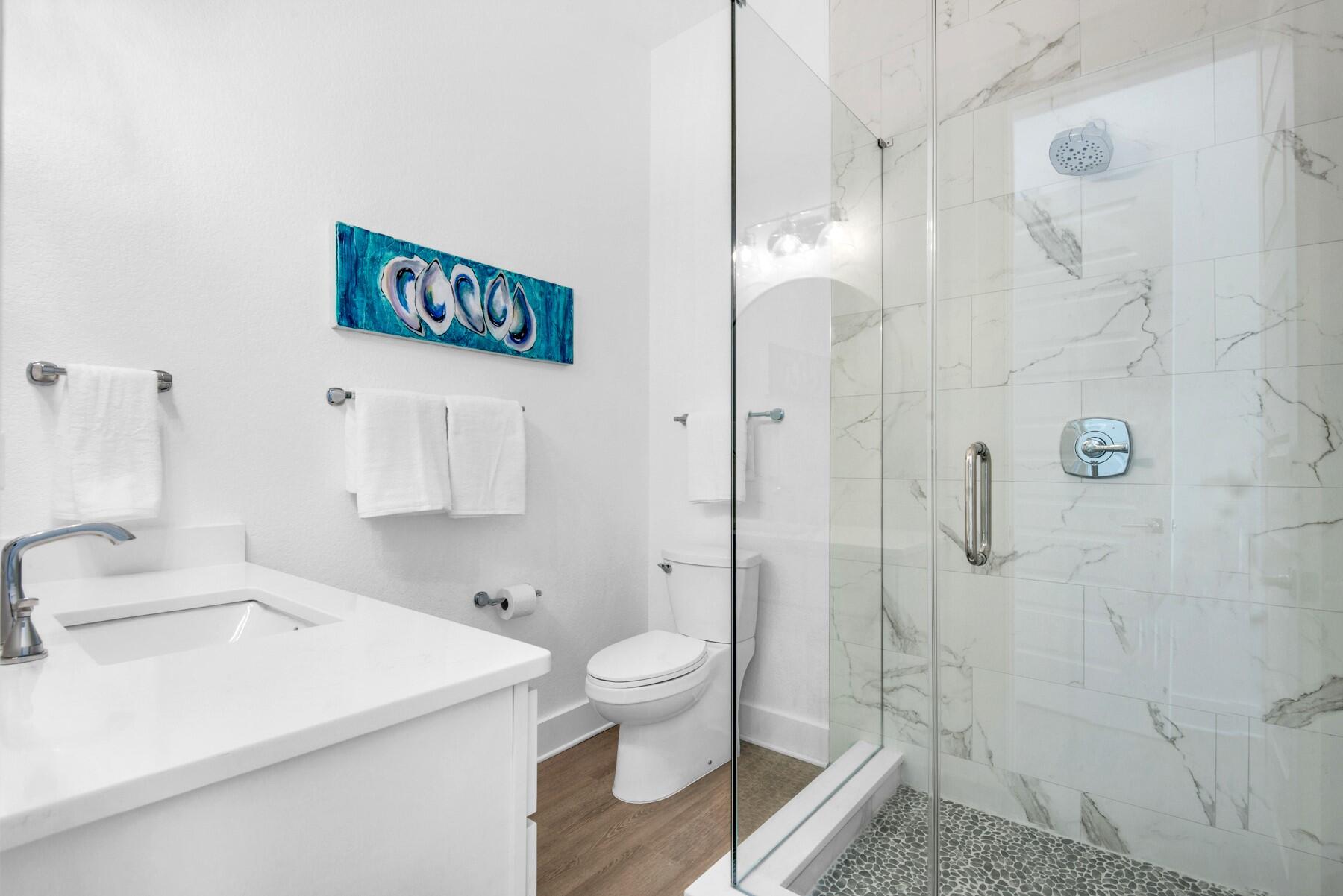 78 Cote D Azur Drive Santa Rosa Beach, FL 32459 - Photo 27 of 80 a bathroom with a sink a toilet and shower