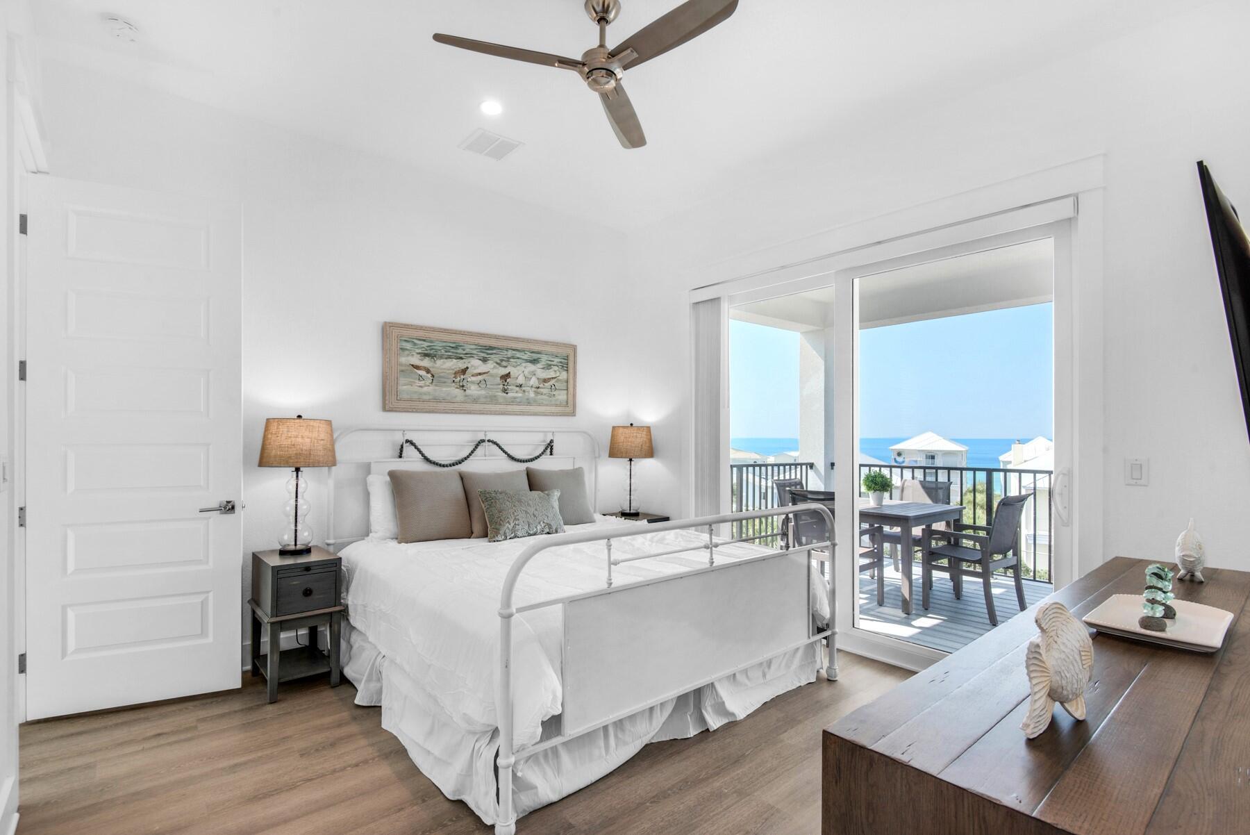 78 Cote D Azur Drive Santa Rosa Beach, FL 32459 - Photo 28 of 80 a bedroom with a bed and a table