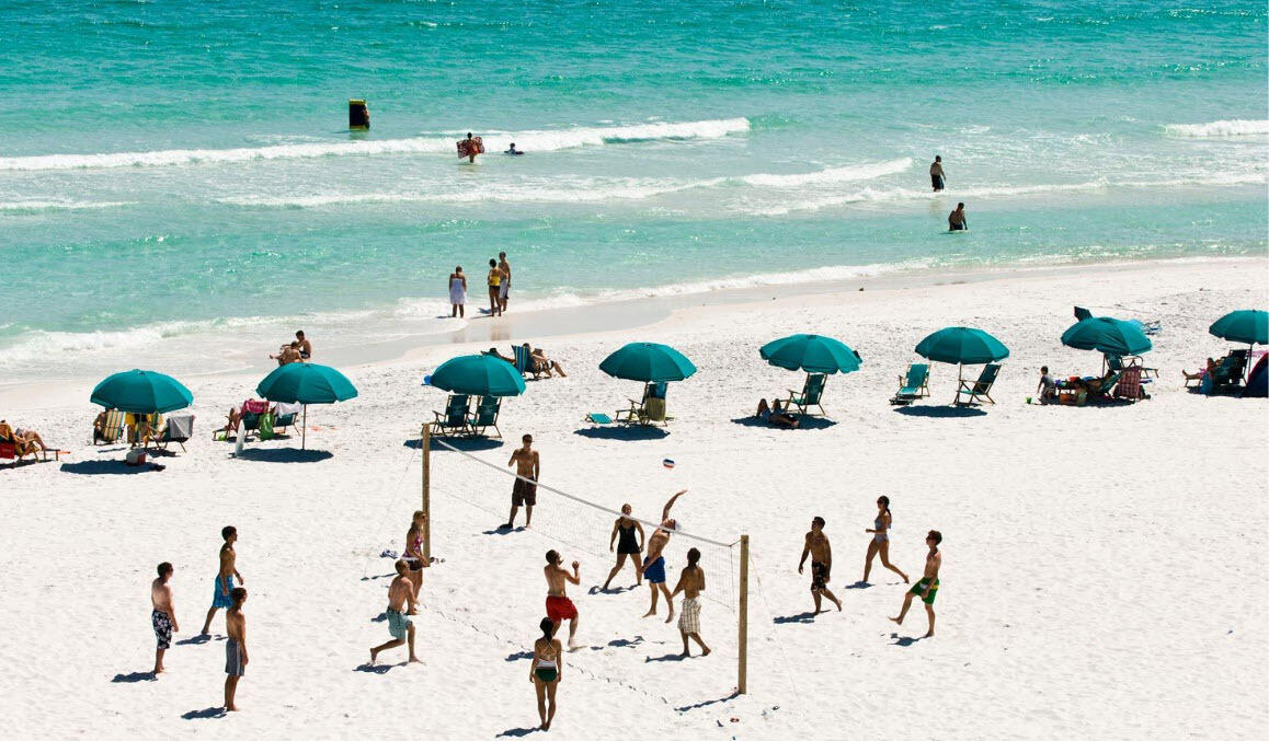 78 Cote D Azur Drive Santa Rosa Beach, FL 32459 - Photo 51 of 80 a vase of flowers sitting on a table with floor to ceiling window