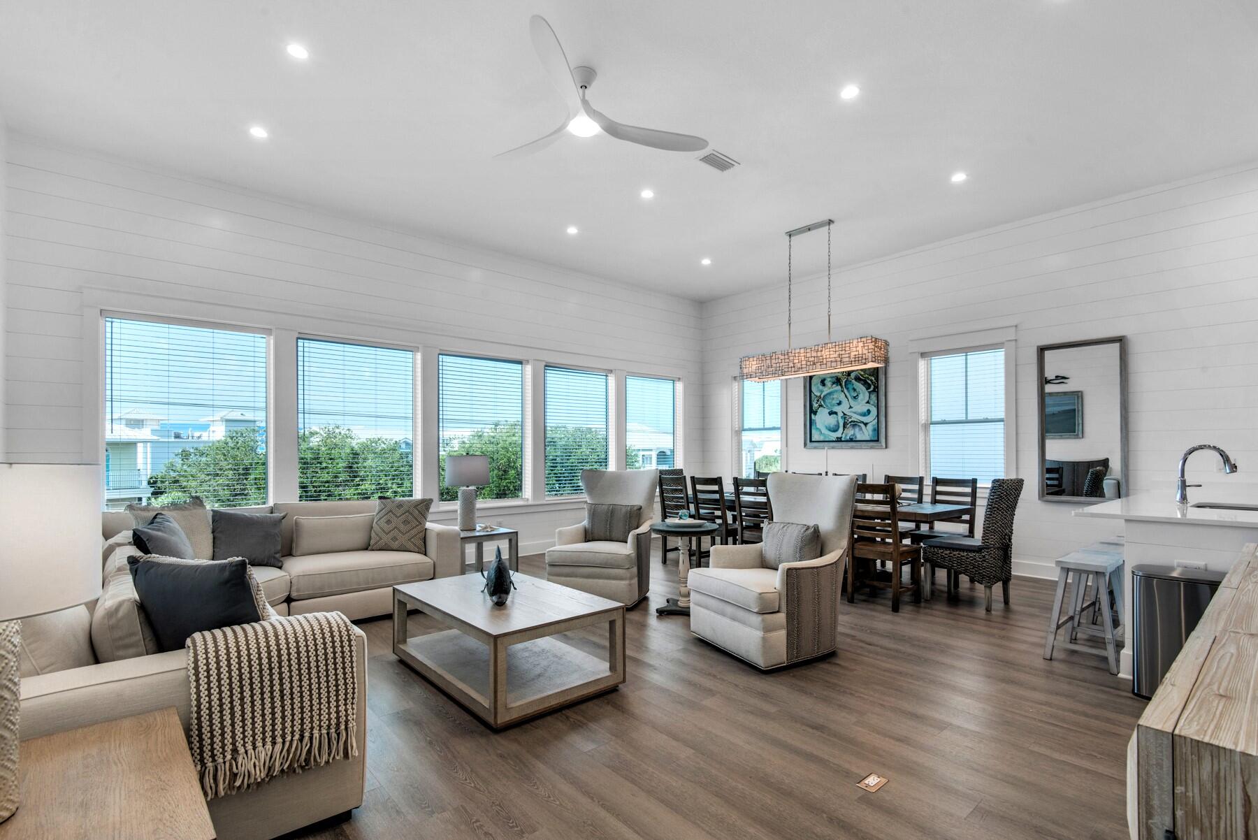 78 Cote D Azur Drive Santa Rosa Beach, FL 32459 - Photo 6 of 80 a living room with furniture and wooden floor