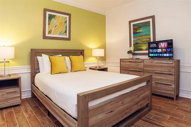 a front view of house with yard and outdoor seating