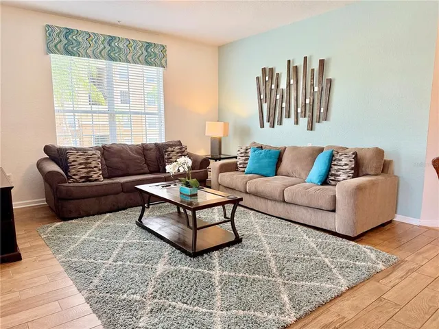 a kitchen with a sink cabinets and appliances