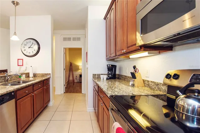 a bed room with a bed and a lamp