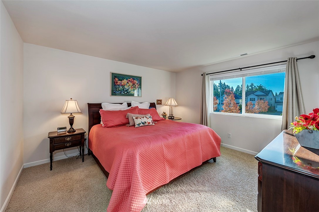 1314 124th Place Southeast Everett, WA 98208 - Photo 11 of 23 a bedroom with a bed and a window