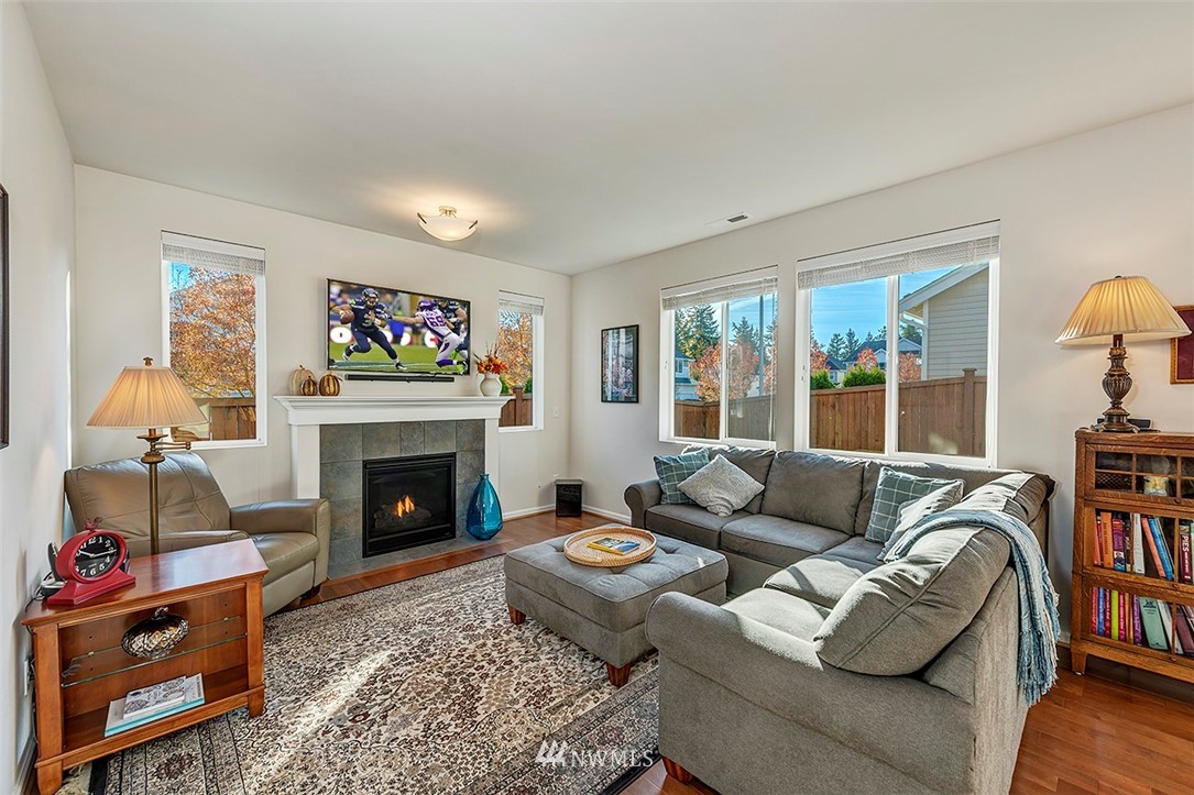 1314 124th Place Southeast Everett, WA 98208 - Photo 4 of 23 a living room with furniture and a fireplace