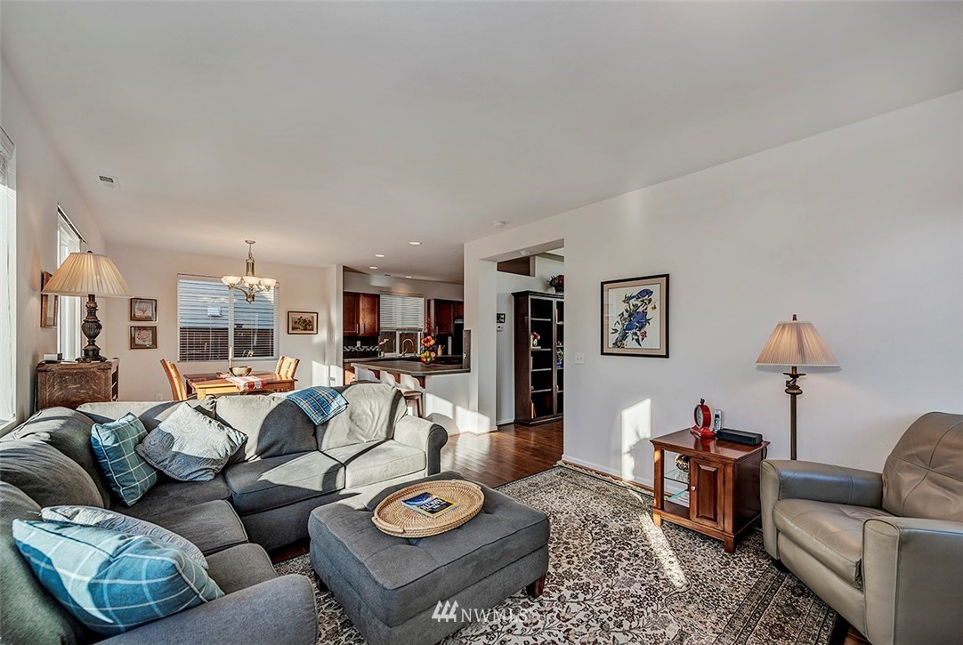1314 124th Place Southeast Everett, WA 98208 - Photo 9 of 23 a living room with furniture and wooden floor