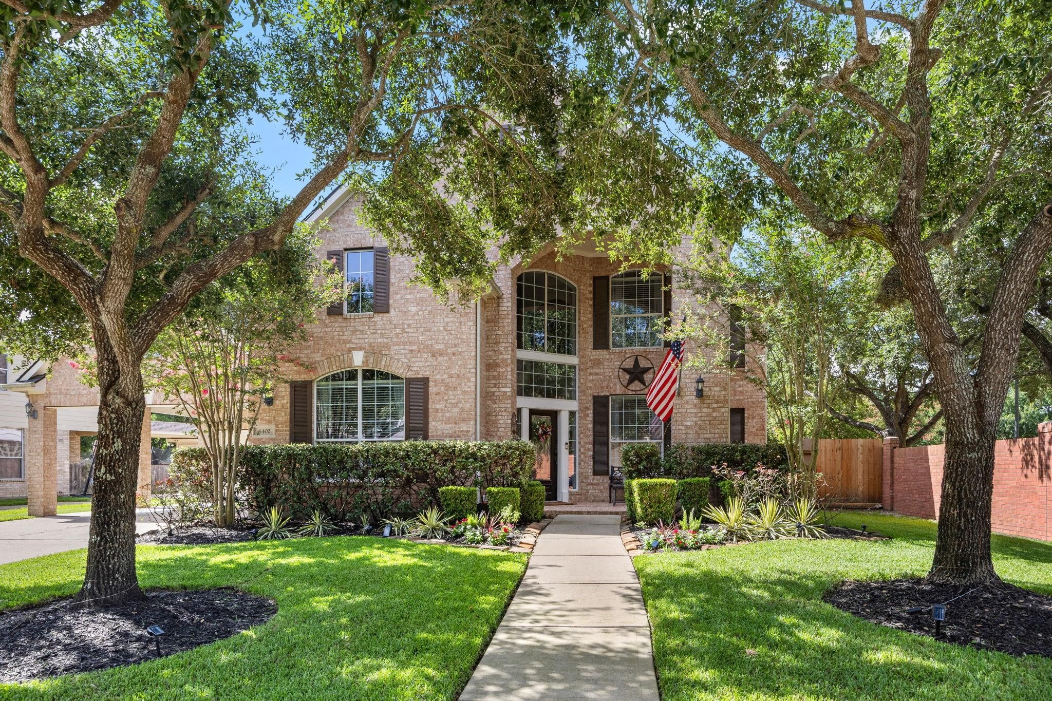 4402 Eden Point Lane Katy, TX 77494 - Photo 4 of 39 WELCOME HOME
TO 4402 EDEN POINT LANE IN kATY, TX. This beautifully maintained brick home in Cinco Ranch West is shaded by mature trees with manicured hedges and a charming brick porch create a warm and inviting curb appeal.