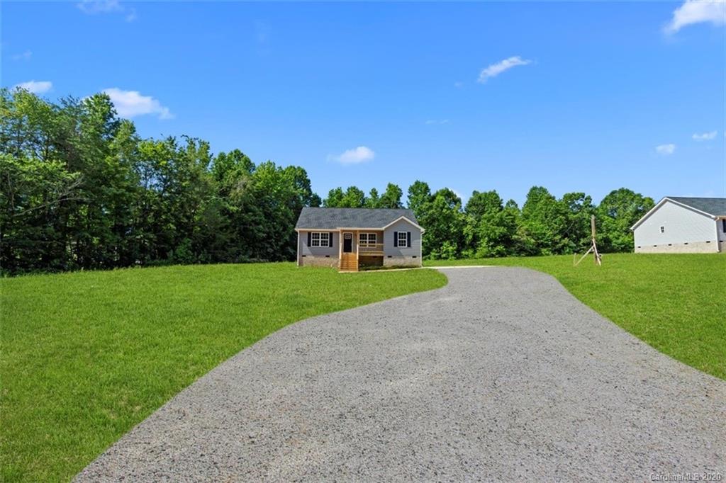 2979 Greenleaf Road, Unit 5 Clover, SC 29710 - Photo 3 of 46 a view of a house with a big yard