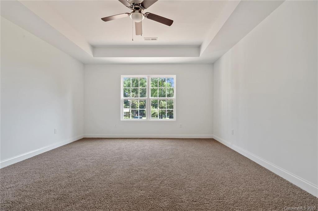 2979 Greenleaf Road, Unit 5 Clover, SC 29710 - Photo 21 of 46 an empty room with a window