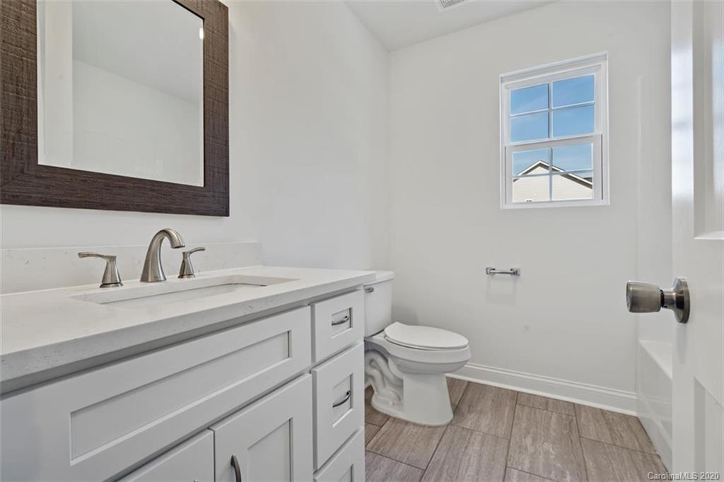 2979 Greenleaf Road, Unit 5 Clover, SC 29710 - Photo 30 of 46 a bathroom with a sink and a toilet