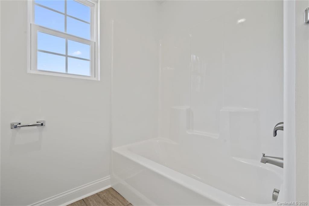 2979 Greenleaf Road, Unit 5 Clover, SC 29710 - Photo 32 of 46 a bathroom with a bathtub
