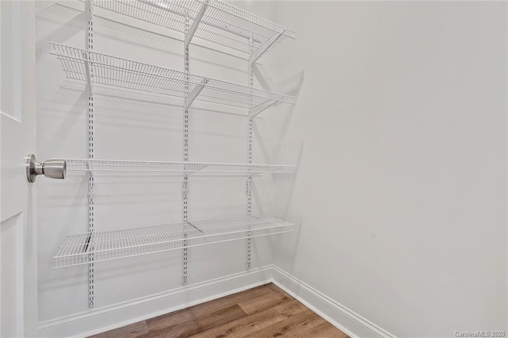 2979 Greenleaf Road, Unit 5 Clover, SC 29710 - Photo 35 of 46 a view of a room with racks on the wall