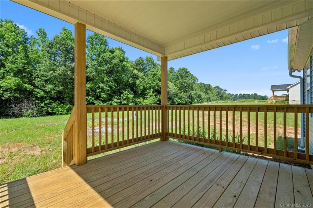 2979 Greenleaf Road, Unit 5 Clover, SC 29710 - Photo 36 of 46 a view of a porch with a yard