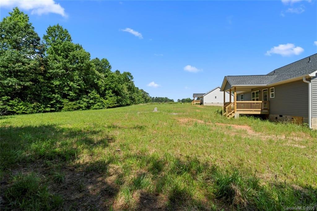 2979 Greenleaf Road, Unit 5 Clover, SC 29710 - Photo 40 of 46 a view of a big yard with potted plants